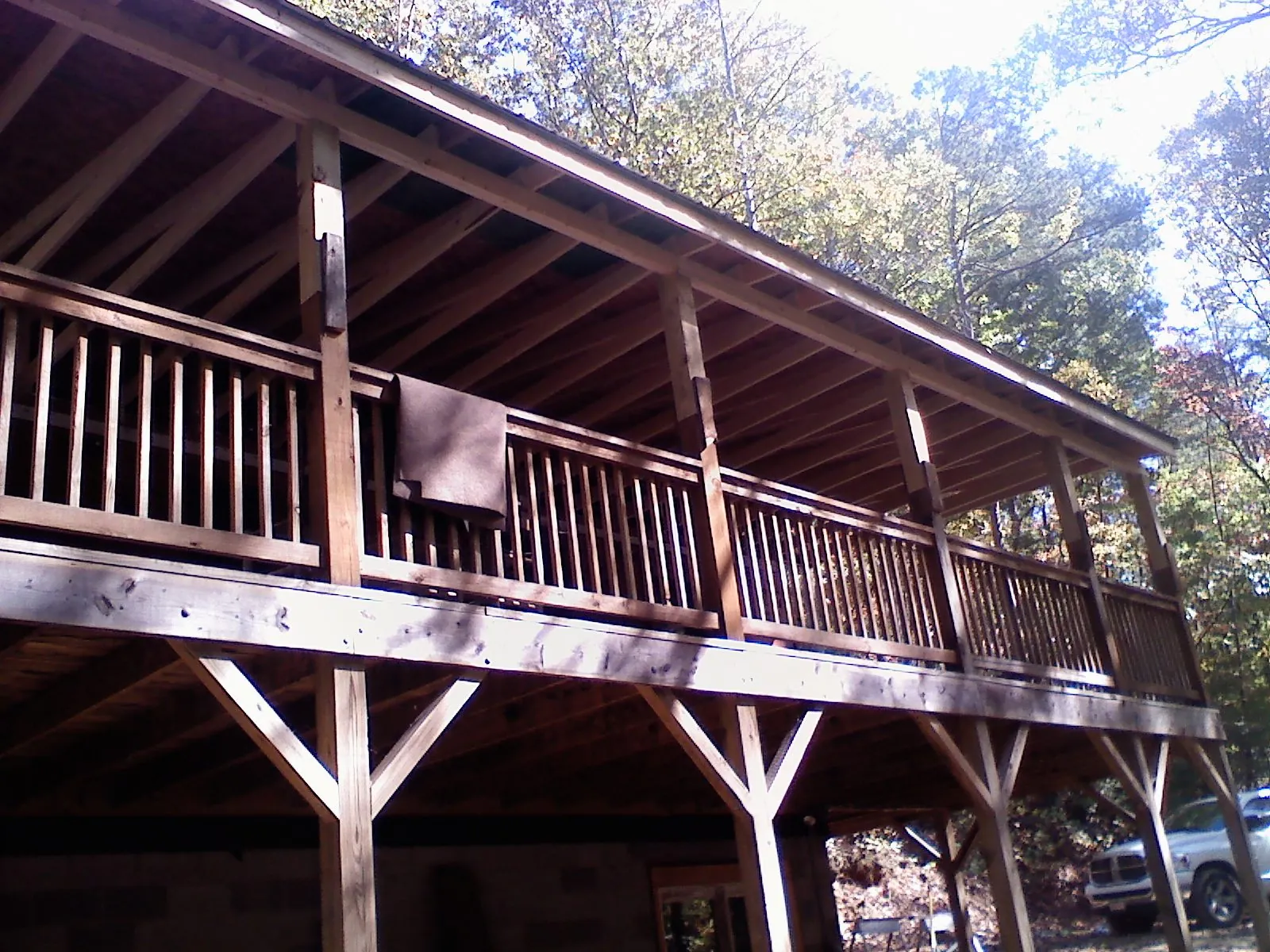 Timber framing under a new elevated porch and deck — Roof Leak Repair in Galena Park by Roofing Brothers